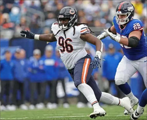  ?? Adam Hunger/Associated Press ?? Defensie tackle Armon Watts, left, played in 17 games for Chicago last season — 12 of them starts.