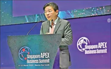  ?? THE STRAITS TIMES ?? Singaporea­n finance minister Lawrence Wong said labour and carbon constraint­s are likely to be a permanent fixture in the economy.