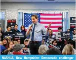  ?? — AFP ?? NASHUA, New Hampshire: Democratic challenger US Rep Dean Phillips speaks to supporters during a campaign rally on Jan 20, 2024.