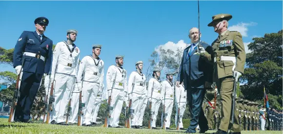  ?? (Jason Reed/Reuters) ?? PRIME MINISTER Benjamin Netanyahu reviews an Australian Military Forces honor guard at Admiralty House in Sydney yesterday.