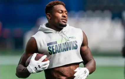  ?? Brashear
AP Photo/Stephen ?? Seattle Seahawks wide receiver DK Metcalf runs with the ball during warmups before an NFL football game against the Dallas Cowboys in Seattle, in this 2020 file photo.