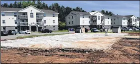  ?? HARRY SULLIVAN/TRURO DAILY NEWS ?? A slab of concrete is all that remains of what used to be a 12-unit apartment building on Brooklyn Drive in Bible Hill. The building was destroyed by fire in late April.