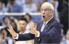  ?? Gerry Broome / Associated Press ?? North Carolina head coach Roy Williams tried to recruit Williamson, but now has to game-plan against him.