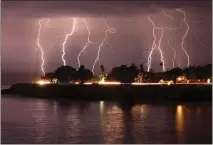  ?? SHMUEL THALER—SANTA CRUZ SENTINEL FILE ?? The lightning storm viewed on West Cliff Drive in Aug. 2020was a cluster of thousands of strikes that produced the CZU Lightning Complex in the Santa Cruz Mountains.