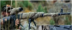  ??  ?? 影片中，使用PSL狙击步枪的­斯穆克手下，注意该枪采用独特的鸟­笼形枪口制退器