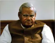  ?? AP FILE PHOTO BY ELIZABETH DALZIEL ?? In this 2004 photo outgoing Indian Prime Minister Atal Bihari Vajpayee attends a meeting with members of his Bharatiya Janata Party at the Prime Minister’s residence in New Delhi, India.