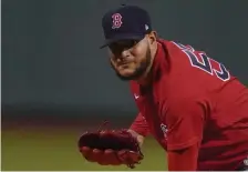  ?? AP FILe; beLoW, Getty IMaGeS FILe ?? ‘FIND A WAY’: Red Sox lefty Eduardo Rodriguez is getting the nod to start Game 3 of the ALCS against Jose Altuve, below, and the Houston Astros tonight at Fenway Park.