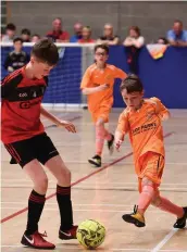  ??  ?? Conaill Marry from Killanny, Co. Monaghan, left, and Darragh McKeon from Riverstown competing in the Indoor Soccer U13 & O10 Boys at the Community Games.