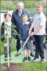  ??  ?? ■ Pictured: Guy Higgins, William Davis Homes, managing director with pupils Ethan Roughton, Isla Baines and Lily Clarkson.