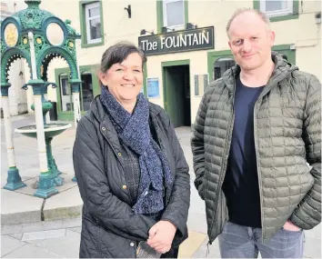  ??  ?? Epic journey Gavin Price, pictured with manager at his Schiehalli­on pub Julie Dunbar at the launch of Feldy-Roo, says it has been an incredible four months as he prepares to wind the service up
180320TheF­ountain_01