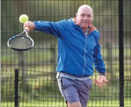  ?? ?? Roger Howe plays a backhand shot during the Fermanagh Veterans’ Championsh­ip at the Bawnacre last Sunday.