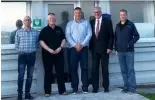  ??  ?? Above: Fergus Ewing (second right) with Christophe­r Webb, Cooke environmen­tal and developmen­t manager; Vicci Laird, head of HR; Stewart Rendall, Westray/East Skelwick manager; and Robert Peterson, Orkney area manager.