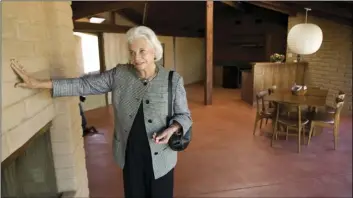  ??  ?? In this 2010 retired Supreme Court Justice Sandra Day O’Connor shows her 1958 adobe home that was moved and restored at the Arizona Historical Society Museum in Tempe, Ariz. DAVID WALLACE/THE ARIZONA REPUBLIC VIA AP