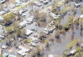  ?? BILL FEIG/THE ADVOCATE ?? A view of flooding in French Settlement, Louisiana, on Thursday as Gov. John Bel Edwards took an aerial tour to assess Hurricane Ida damage.