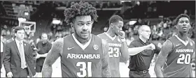  ?? NWA Democrat-Gazette/CHARLIE KAIJO ?? Guard Anton Beard (31) and the Arkansas Razorbacks are 8-8 against NCAA Tournament teams this season, but Beard said he believes he and his teammates are prepared for the tournament. “We’ve been working on this all year. We’ve had one of the hardest...