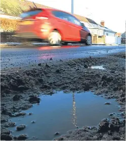  ?? Picture: Dougie Nicolson. ?? Scotland is facing a £1.2 billion pothole backlog.