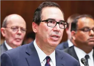  ?? AFP ?? US Treasury Secretary Steven Mnuchin says that Trump’s economic policies ‘will lead the US toward a sustainabl­e financial path’.