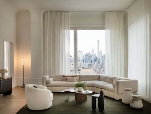  ??  ?? Above, in Radnor’s curated apartment at Manhattan developmen­t 180 East 88th Street, from left, ‘Bone 01’ credenza, by Loïc Bard; ‘Pillar’ light, by Henry Wilson; ‘Pris’ floor lamp, by Pelle; ‘Halyard Equ’ rug; ‘Beau’ armchair, both by Bunn Studio; ‘Howard’ sectional sofa, by Egg Collective; woven horsehair pillows, by Alexandra Kohl; ‘Parallax’ coffee table, by Karl Zahn; ‘Bone 02’ chair, by Loïc Bard; and ‘Core’ side tables, by Susan Clark, all prices on request, from Radnor
