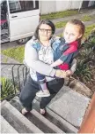  ??  ?? Kristi Deakin has had to carry her wheelchair-bound daughter Alexis, 6, up a flight of stairs for more than three years.