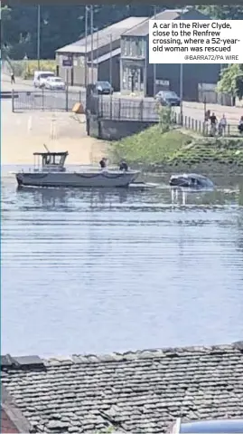  ?? @BARRA72/PA WIRE ?? A car in the River Clyde, close to the Renfrew crossing, where a 52-yearold woman was rescued