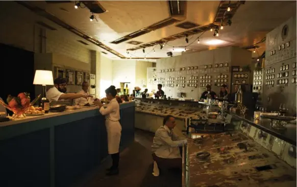  ?? MELISSA RENWICK PHOTOS/TORONTO STAR ?? The old control room at the Hearn Generating Station has been transforme­d into a pop-up French restaurant for this year’s Luminato Festival.