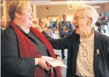  ?? MILLICENT MCKAY/JOURNAL PIONER ?? Jodi Swan, left, laughs with Island Seniors of the Year recipient Evelyn Jenkins. Jenkins was one of five Island seniors rewarded Monday in Summerside, for their commitment to their communitie­s. The four others include: Grace Blackette, Kaye Larkin, Anne Sherman and Fairley Yeo.