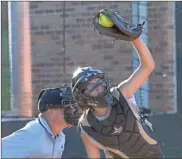  ??  ?? Ridgeland catcher Kylie Collins has to react fast to snare a high pitch in a home game last week against Northwest Whitfield.