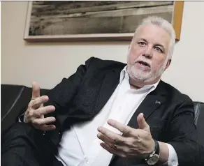  ?? ALLEN MCINNIS ?? Quebec Premier Philippe Couillard says that his government would be “cautious” while maintainin­g fiscal responsibi­lity.