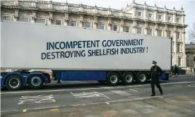  ?? Photograph: Amer Ghazzal/Rex/Shuttersto­ck ?? A lorry belonging to a Scottish seafood supplier at a protest against Brexit red tape at Westminste­r. ‘The cost is already being paid, as fish and other animal products rot before they can be cleared for continenta­l markets.’