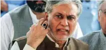  ?? - Reuters file photo ?? IN TROUBLE: Pakistan’s Finance Minister Ishaq Dar is seen after a party meeting in Islamabad, on September 26, 2017.