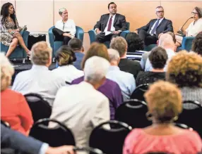  ??  ?? From left, Areva Martin, Dr. Kathryn Edin, David Bowers, Dr. Christophe­r Herbert, and Kalima Rose discuss the Fair Housing Act during the Habitat for Humanity of Greater Memphis Building the Beloved Community: A Conversati­on about the Fair Housing Act...