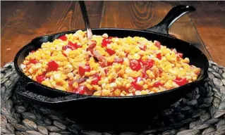  ??  ?? For maque choux, saute chopped onion and bell peppers in fat, then stir in the corn, garlic and bacon. Finish the dish with seasonings and a little cream.