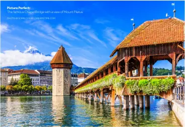  ?? PHOTO: © SORIN COLAC | DREAMSTIME.COM ?? Picture Perfect:
The famous Chapel Bridge with a view of Mount Pilatus