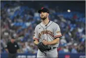  ?? ANDREW LAHODYNSKY­J — THE CANADIAN PRESS ?? San Francisco Giants starting pitcher Alex Wood (57) reacts after being taken out of the game during the seventh inning against the Toronto Blue Jays in Toronto on June 27.