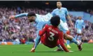  ?? Photograph: Molly Darlington/Reuters ?? Rayan Aït-Nouri collides with Josko Gvardiol to concede an early penalty at the Etihad.