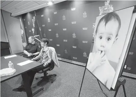  ?? DARREN STONE, TIMES COLONIST ?? Tasha Brown speaks to the media with a photo of her daughter, Kaydance, at the Saanich police station on Monday. Brown’s estranged wife is accused of parental abduction after she defied a court order by leaving the country with Kaydance in May.