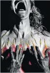  ?? LISA MURDOCKTOL­MIE, LADY ON FIRE PHOTOGRAPH­Y ?? Mutter used flames on Jennifer Collins to illustrate what having a concussion is like.