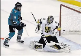  ?? Marcio Jose Sanchez ?? The Associated Press Golden Knights goaltender Marc-andre Fleury stops a shot next to San Jose Sharks center Joe Pavelski in the third period of a regular-season game Feb. 8 in San Jose, Calif. Pavelski brings a vast skill set to the ice for the Sharks.