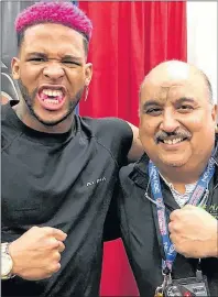  ?? SUBMITTED PHOTO ?? Truro dentist Dr. Anil Makkar, right, is seen with American fitness model Terron Beckham, cousin of New York Giants receiver Odell Beckham, during the 2018 Arnold Sports Festival in Columbus, Ohio. Beckham is sporting a New Age Performanc­e mouthpiece.