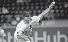  ?? BILL KOSTROUN/AP PHOTO ?? New York Mets pitcher Jason Vargas delivers the ball to the Atlanta Braves during the first inning of Thursday’s game at New York.