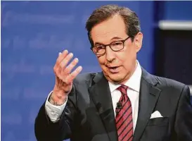  ?? John Locher / Associated Press ?? Moderator Chris Wallace of Fox News talks to the audience before the start of the debate. He has earned positive reviews on social media.