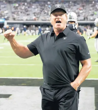  ?? ETHAN MILLER/GETTY ?? Raiders head coach Jon Gruden reacts to the crowd during warmups before a preseason game against the Seahawks on Aug. 14 in Las Vegas.