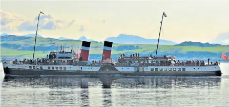  ?? PHOTO: HUGH DOUGHERTY ?? Sailing serenely, Waverley approaches Largs Pier, with Cumbrae and the mountains of Arran behind, to decant a full load of passengers on August 22.
Full details of supporting Waverley are at www.waverleyex­cursions. co.uk