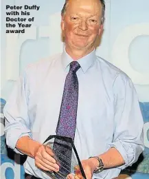  ??  ?? Peter Duffy with his Doctor of the Year award