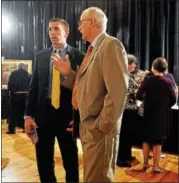  ??  ?? John Hendrickso­n, Frederick Living CEO, speaks with Nathan Yorgey, vice-chairman of the board, during the reception before dinner at the 120th Star-Studded Event at the Sunnybrook Ballroom.