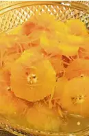  ??  ?? Refreshing dessert of orange slices