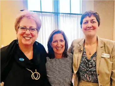  ?? [PHOTO BY CARLA HINTON, THE OKLAHOMAN] ?? Caryl M. Stern, president and chief executive officer of UNICEF USA, poses for a picture with Lori Blumenthal, president of the Jewish Federation of Greater Oklahoma City; and Roberta Clark, the Jewish Federation’s executive director, at a luncheon in Oklahoma City.