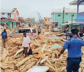  ?? AFP ?? Chaos, Tod und Zerstörung – auch im Ort Roseau auf Dominica