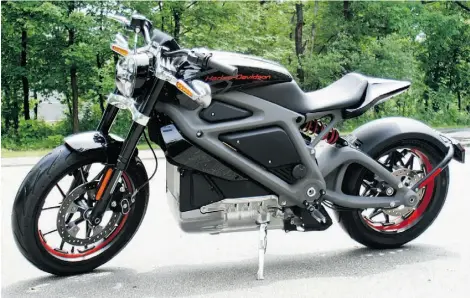  ?? M.L. JOHNSON/THE ASSOCIATED PRESS ?? Harley-Davidson’s new electric motorcycle sits outside the company’s research facility in Wauwatosa, Wis., on Wednesday. The company plans to unveil the LiveWire model on Monday, June 23, at an invitation-only event in New York.