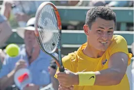  ??  ?? Australia’s Bernard Tomic plays against Jack Sock of the US.